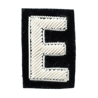 Stylized letter E stamp